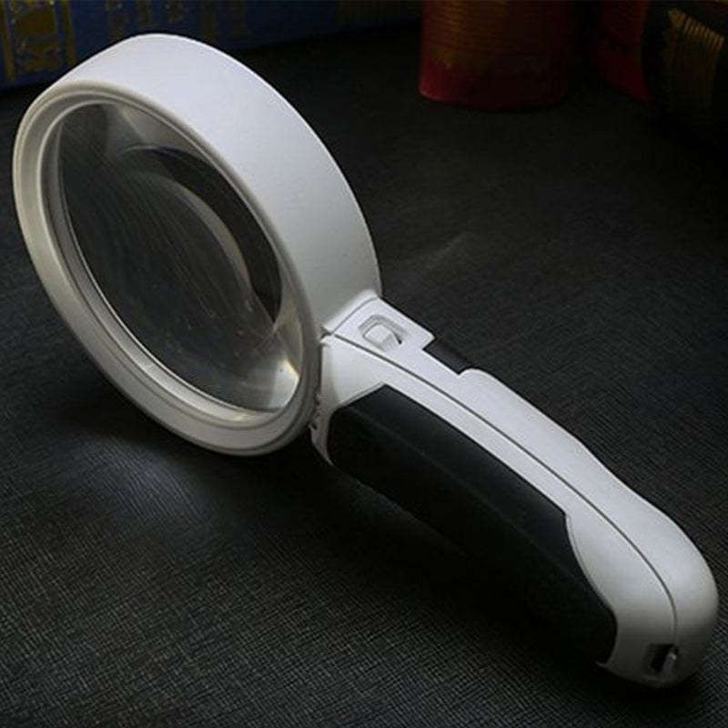 "20X optiskt förstoringsglas med LED-ljus, rund lins, användarvänlig design, optimal för detaljerad läsning."