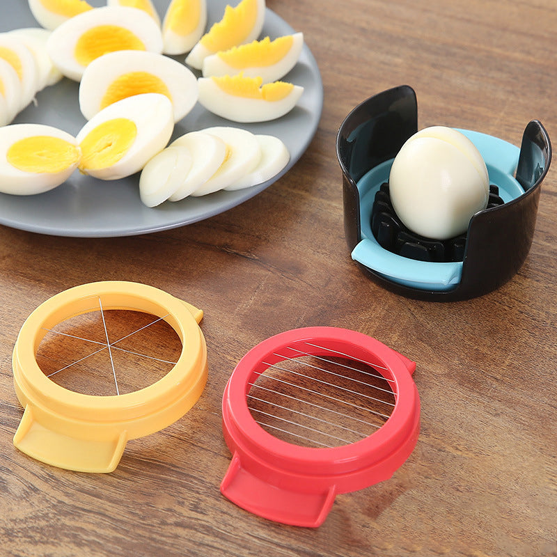"Äggskärare i rostfritt stål och ABS, elegant design, med ergonomiskt handtag, perfekt för enkel äggskivning."