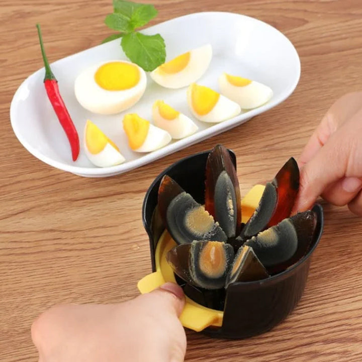 "Äggskärare i rostfritt stål och ABS, elegant design, med ergonomiskt handtag, perfekt för enkel äggskivning."