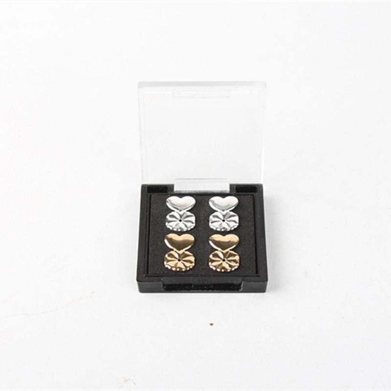 Allergivänliga damhängen ploppar i guld och silver, lyfter och stabiliserar örhängen, liten och diskret design.