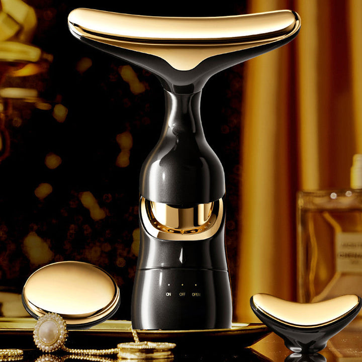 "Ansiktsmassager med sonic vibration och mikroström, vit plast, tre huvud, elegant ergonomisk design, för skönhetsvård hemma.