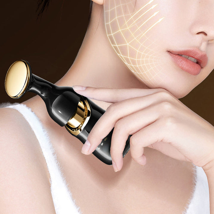 "Ansiktsmassager med sonic vibration och mikroström, vit plast, tre huvud, elegant ergonomisk design, för skönhetsvård hemma.