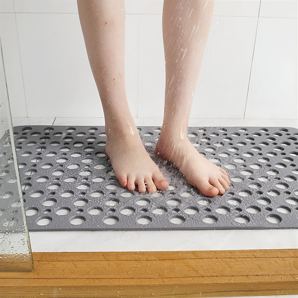 "Antibakteriell duschmatta, halkfri och hygienisk, i elegant vit design, idealisk för säkra och rena badrum."