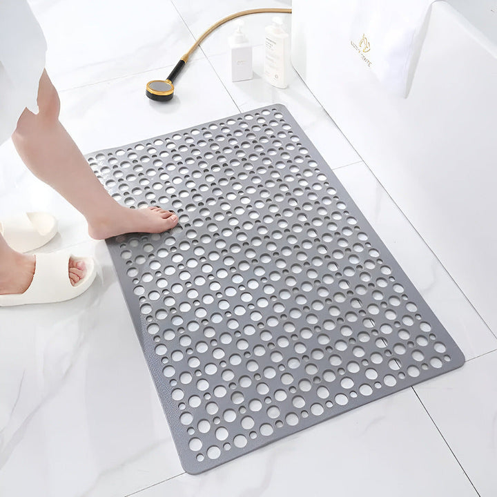 "Antibakteriell duschmatta, halkfri och hygienisk, i elegant vit design, idealisk för säkra och rena badrum."