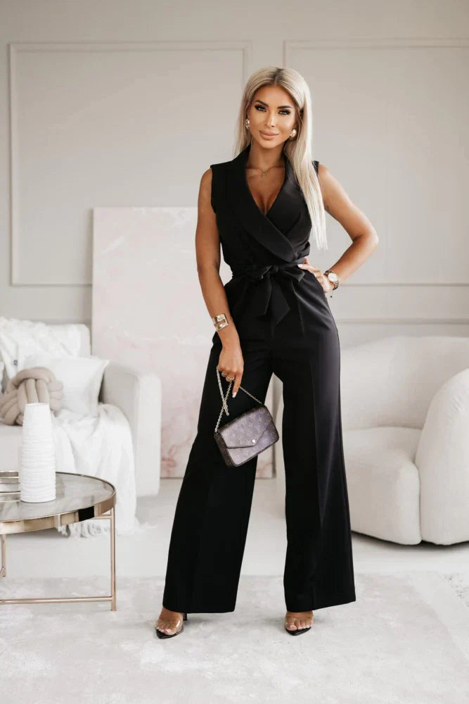 "Ärmlös dam jumpsuit med v-ringning och vida ben, elegant passform, perfekt för formella och avslappnade tillfällen"