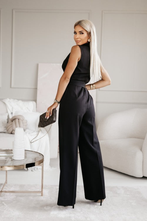 "Ärmlös dam jumpsuit med v-ringning och vida ben, elegant passform, perfekt för formella och avslappnade tillfällen"