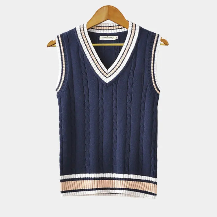 "Ärmlös tröja för män, elegant och tidlös design, klassiska färger som vit och blå, perfekt för sofistikerad stil."