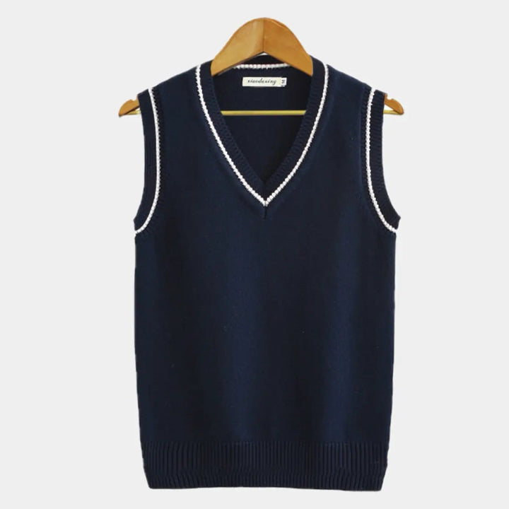 "Ärmlös tröja för män, elegant och tidlös design, klassiska färger som vit och blå, perfekt för sofistikerad stil."
