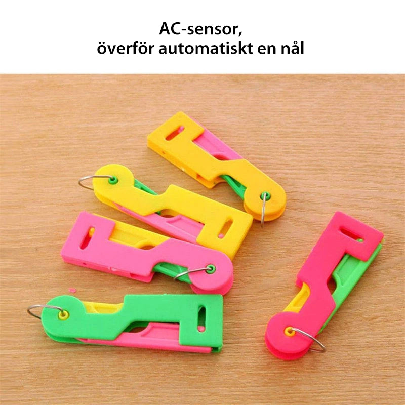 "Automatisk nålträdare för sömnad i plast, slumpmässig färg, kompaktdesign, sparar tid vid trådning, perfekt för nybörjare."