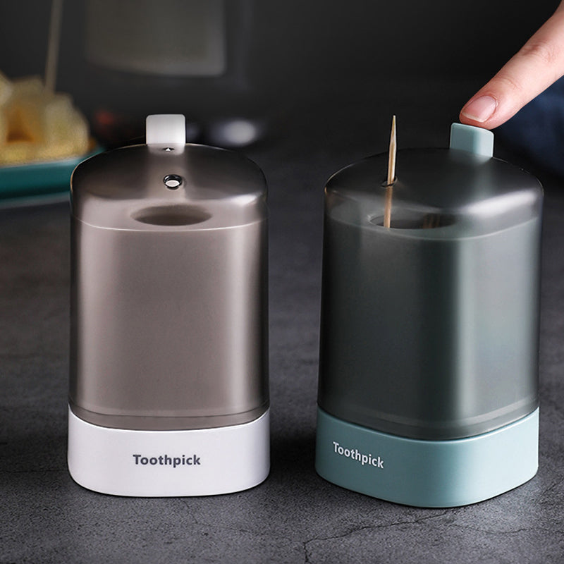 "Automatisk popup-tandpetarlåda i vit, blå, grön för köket, med modern design och praktisk funktionalitet."