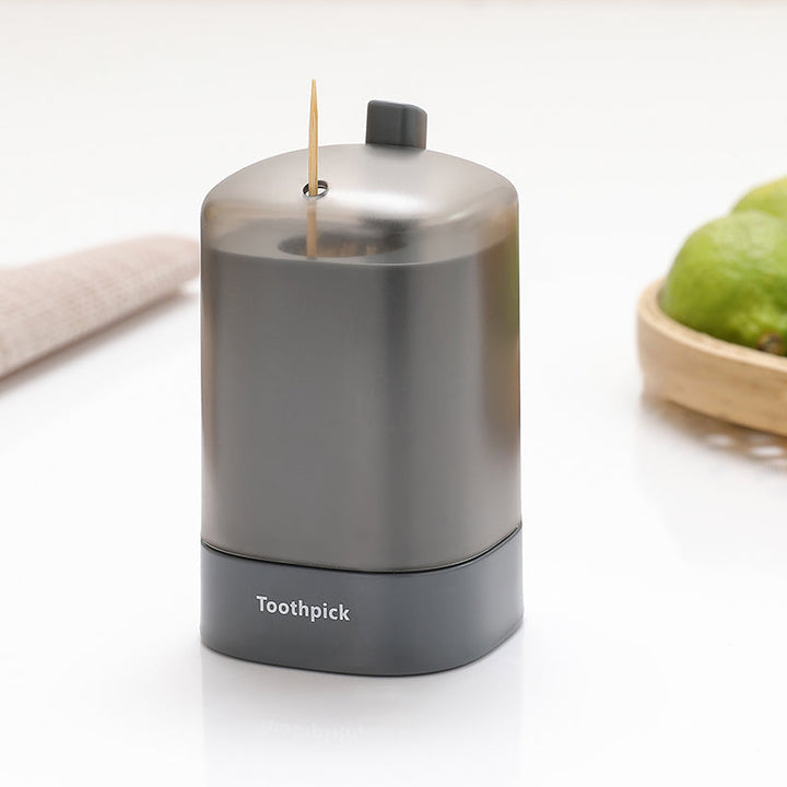 "Automatisk popup-tandpetarlåda i vit, blå, grön för köket, med modern design och praktisk funktionalitet."