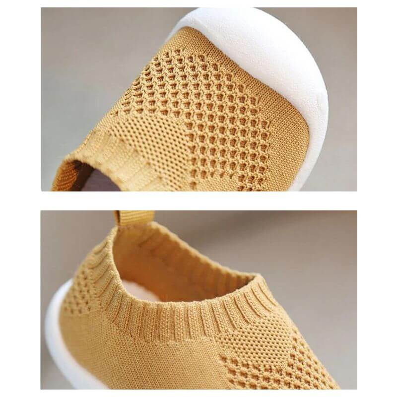 Babyskor med andningsbart nät och slitstark halkfri sula, optimala för nyfikna små upptäckare.