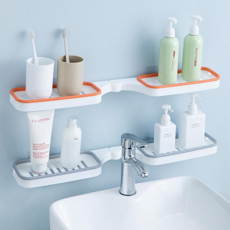 "Badrumshörn förvaringshylla grå/orange, stansfri design, 180° rotation; maximerar förvaring i hörn utan borrning."