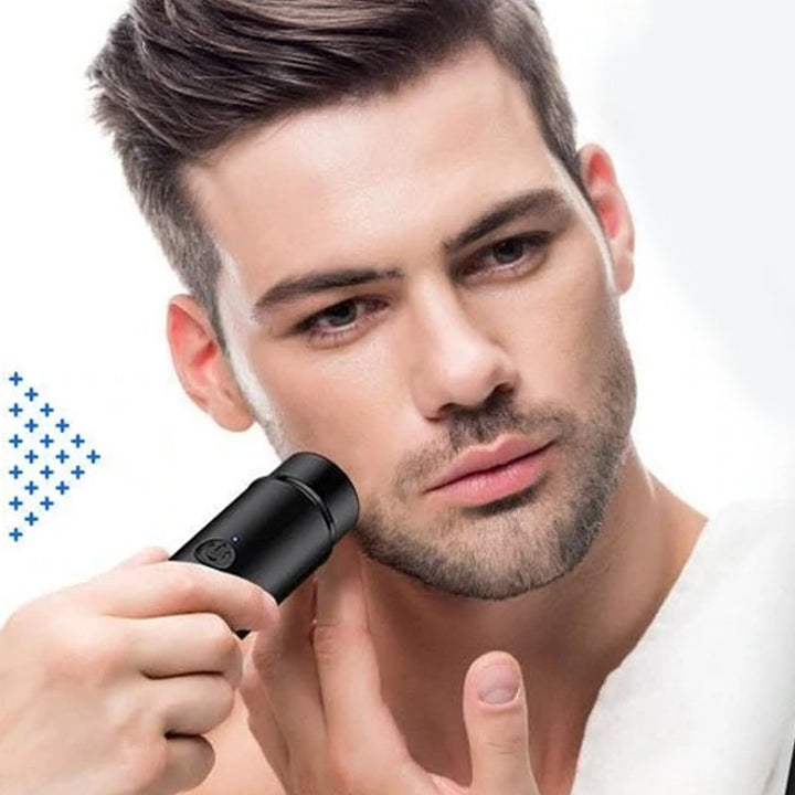 "Bärbar elektrisk rakapparat i aluminium, kompakt design, svart färg, perfekt för ansikte och kropp, IPX7 vattentät."