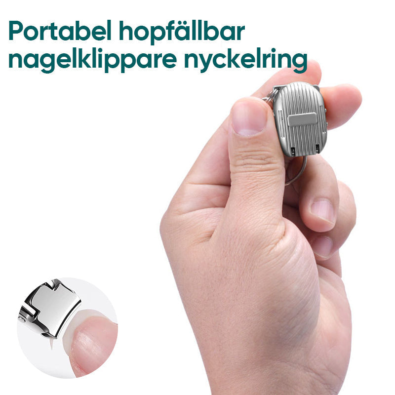 "Bärbar hopfällbar nagelklippare för nyckelring, kompakt design i rostfritt stål för enkel och effektiv nagelvård."