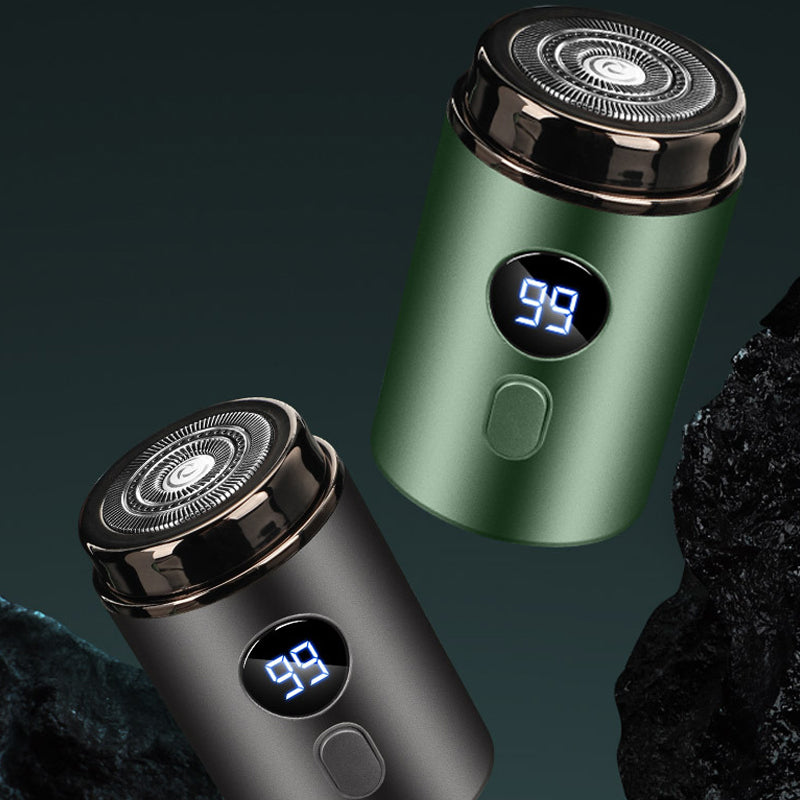 "Bärbar mini elektrisk rakapparat, kompakt design, ergonomiska konturer, idealisk för resor och daglig rakning."