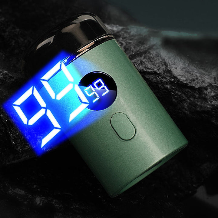 "Bärbar mini elektrisk rakapparat, kompakt design, ergonomiska konturer, idealisk för resor och daglig rakning."