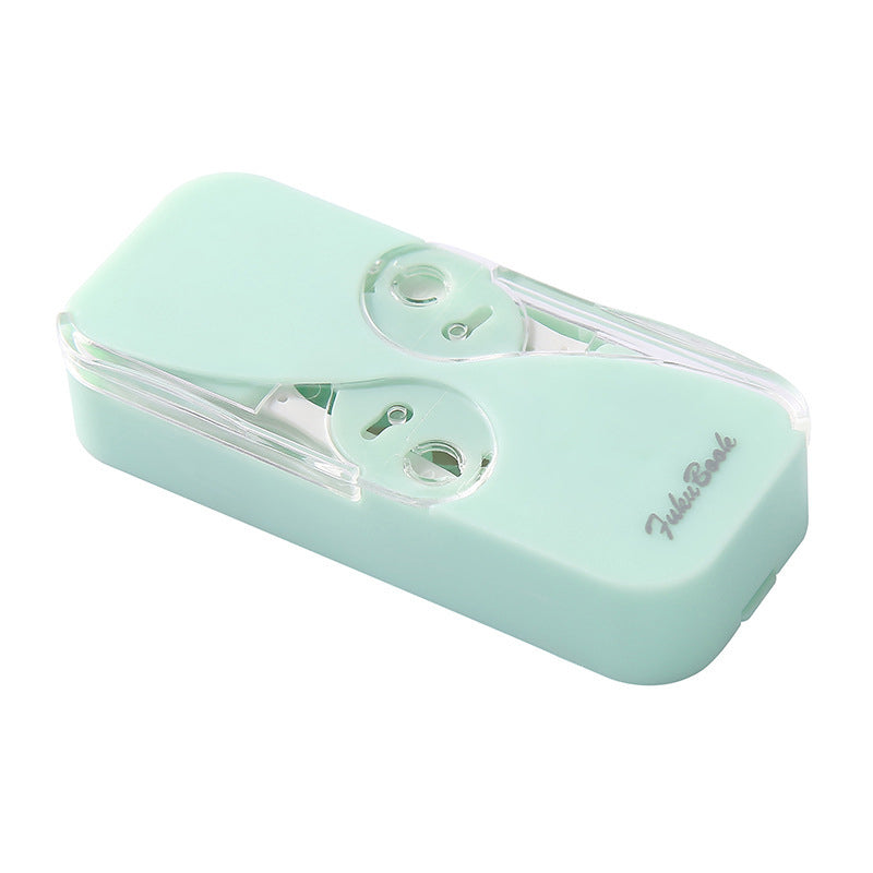 "Bärbar multifärgad tandtrådsdispenser, kompakt design i flera färger, idealisk för reser och dagligt bruk."