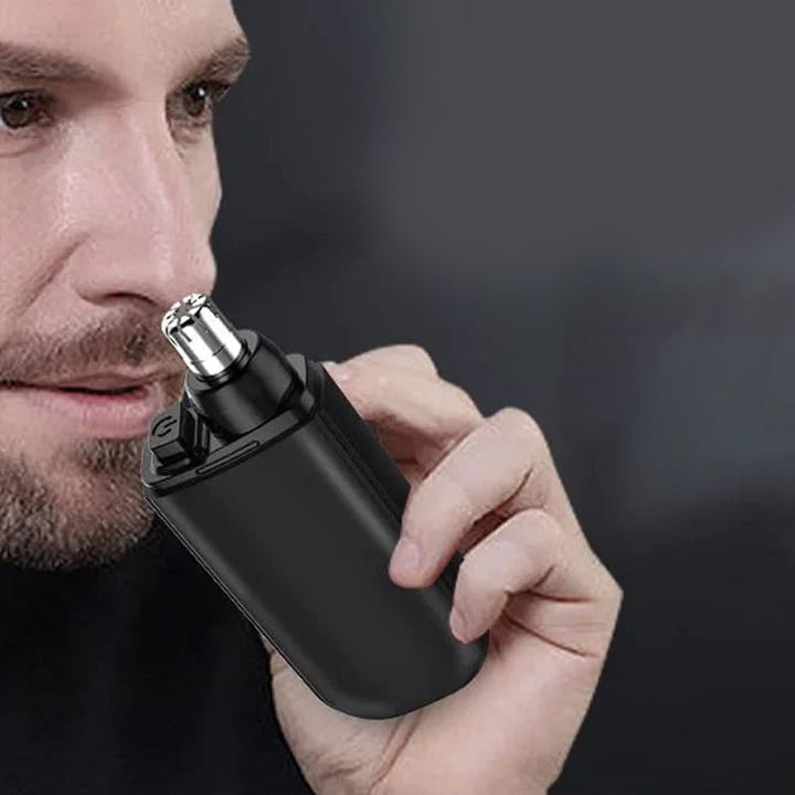 "Bärbar näshårstrimmer i stilren design, kompakt och vattentät, perfekt för smärtfri trimning av näshår."