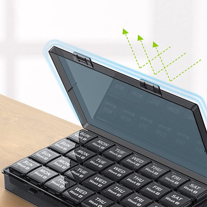 "Bärbar pillerorganisatör med 28 fack, stor kapacitet, genomskinligt material, smart organisering för resor och hemmabruk."