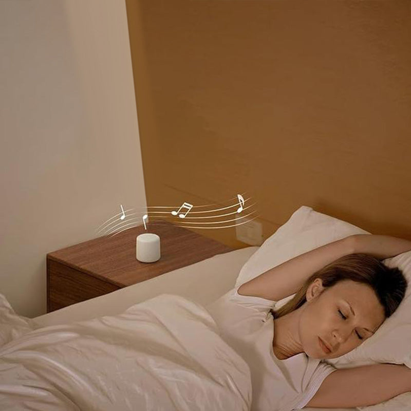 "Bärbar trådlös Bluetooth-högtalare i macaroon-färg med modern design, kompakt och lätt, perfekt för resor och hemmet."