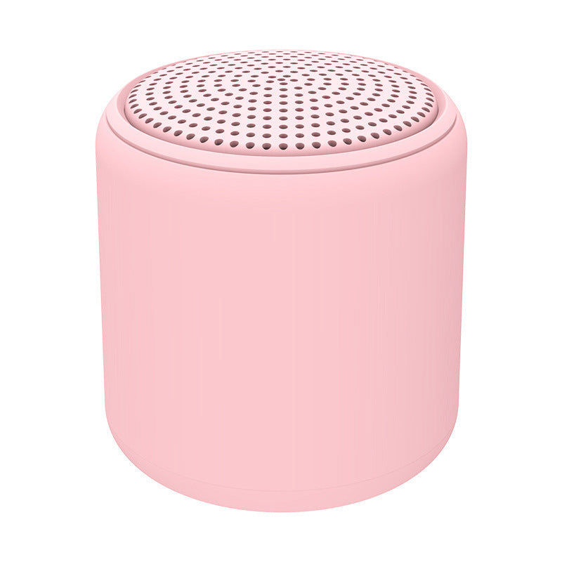 "Bärbar trådlös Bluetooth-högtalare i macaroon-färg med modern design, kompakt och lätt, perfekt för resor och hemmet."