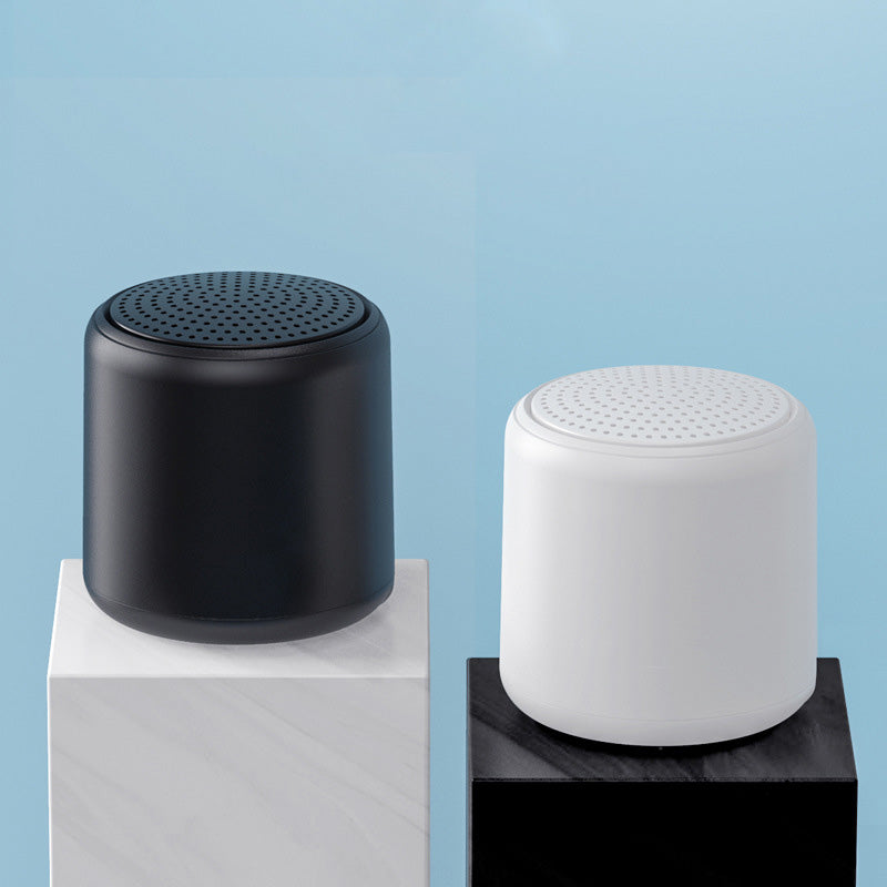 "Bärbar trådlös Bluetooth-högtalare i macaroon-färg med modern design, kompakt och lätt, perfekt för resor och hemmet."