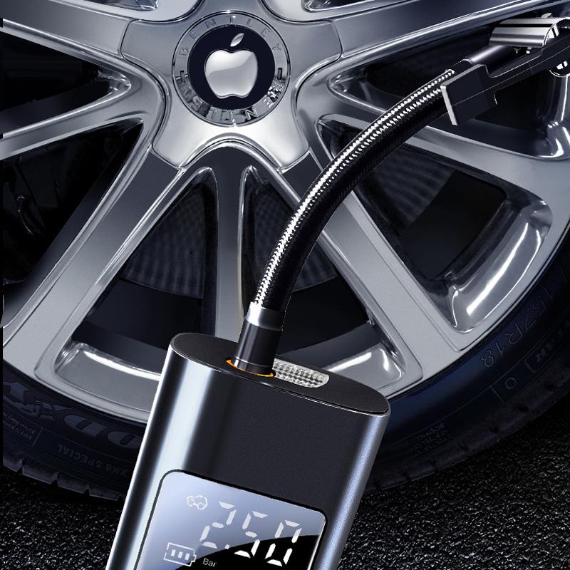 "Bärbar trådlös luftpump med LED-display, kompakt design, visar exakt däcktryck, multifunktionella munstycken."