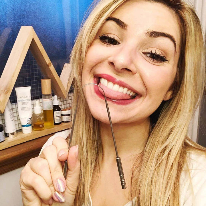 "Bärbar tungskrapa i rostfritt stål för munhygien, elegant design, effektiv, hållbar, lätt att använda."