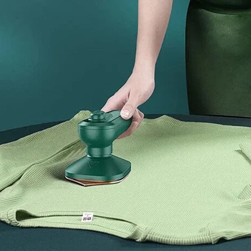 "Bärbart mini ångstrykjärn med kompakt design, kraftfull ånga, röd färg, perfekt för resor och olika tyger."