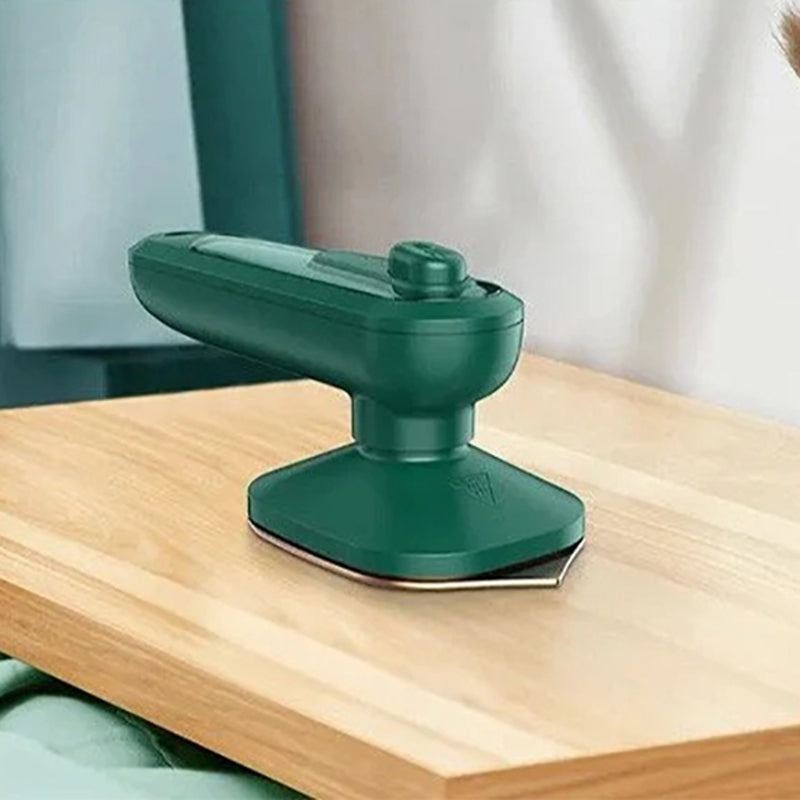 "Bärbart mini ångstrykjärn med kompakt design, kraftfull ånga, röd färg, perfekt för resor och olika tyger."