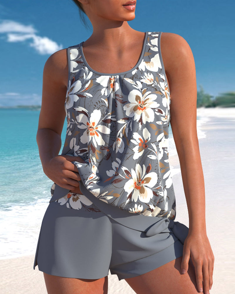 Blommigt dam tankini set med ärmlöst linne och shorts, perfekt för stranden, kombinerar stil och komfort.
