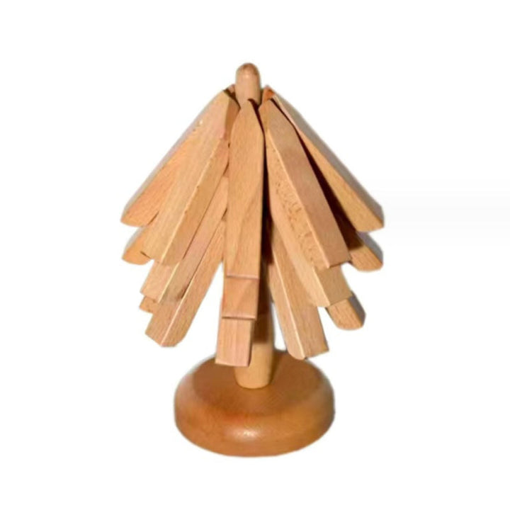 "Bordsmatta i svart valnötsträ, värmeisolerande, elegant design, i köket, hållbar naturprodukt."