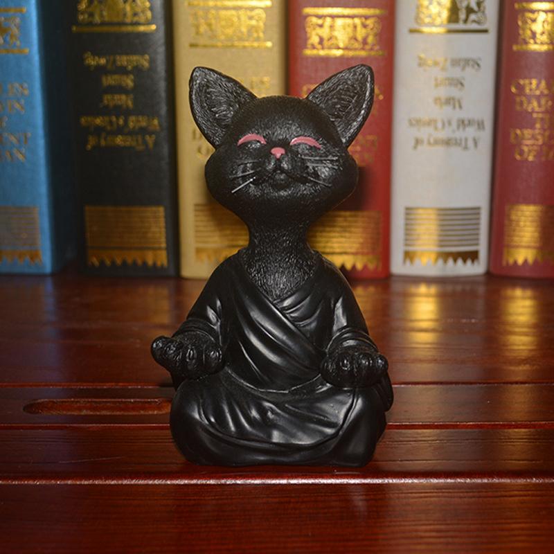 "Buddha prydnadskatt i harts, Zen dekoration med elegant design i svart, grå eller orange för hemmet."