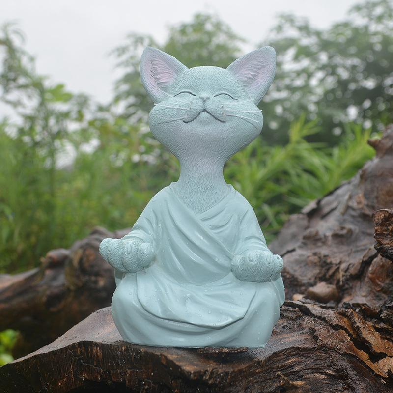 "Buddha prydnadskatt i harts, Zen dekoration med elegant design i svart, grå eller orange för hemmet."