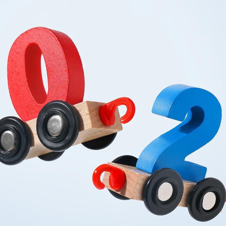 Charmigt färgglatt träledningståg för barn; pedagogisk leksak med magnetiska vagnar, främjar motoriska färdigheter.