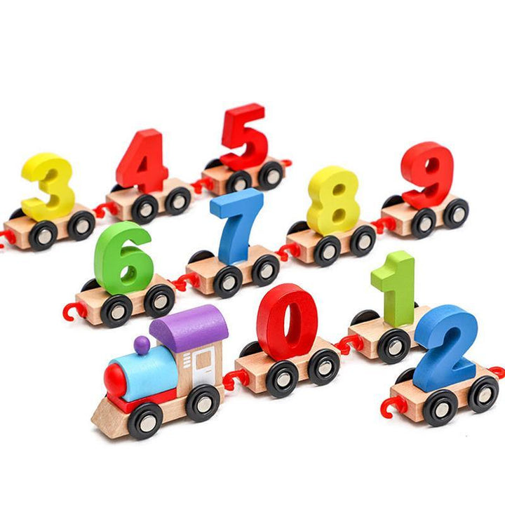 Charmigt färgglatt träledningståg för barn; pedagogisk leksak med magnetiska vagnar, främjar motoriska färdigheter.