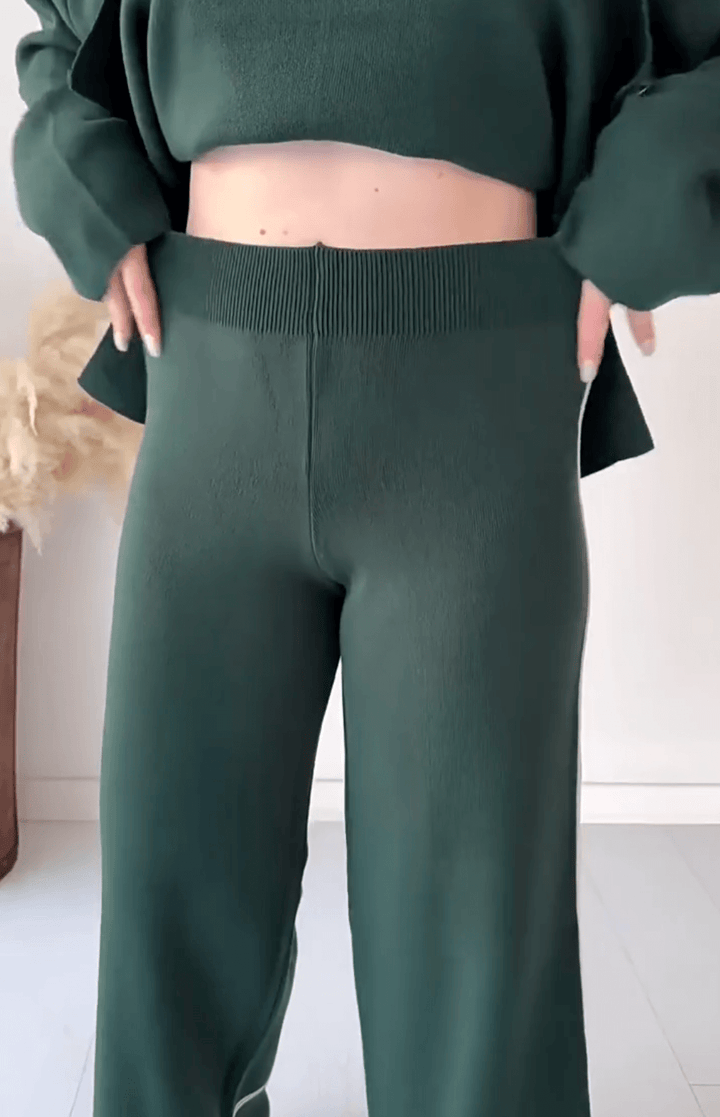 "Chic loungseset för kvinnor med vid byxa och oversized topp i mjukt, andningsbart tyg. Stilrent och bekvämt."