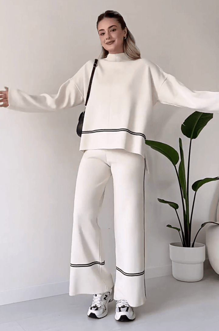 "Chic loungseset för kvinnor med vid byxa och oversized topp i mjukt, andningsbart tyg. Stilrent och bekvämt."