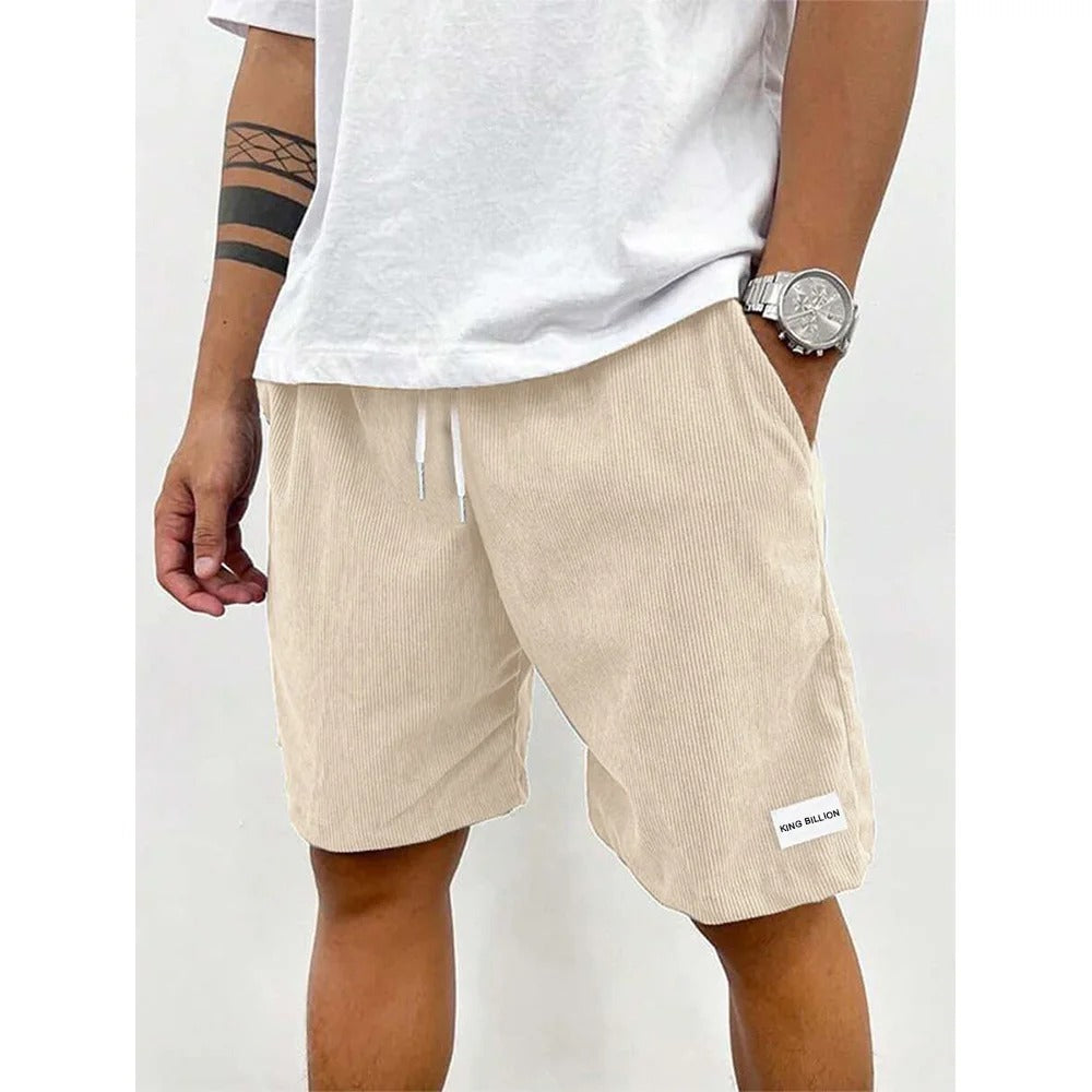 Corduroy shorts för herrar i mjuk struktur, avslappnad passform, beige färg, med praktiska fickor för vardaglig stil.