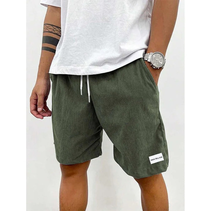 Corduroy shorts för herrar i mjuk struktur, avslappnad passform, beige färg, med praktiska fickor för vardaglig stil.