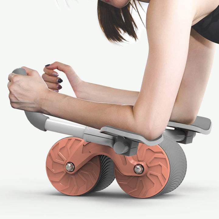 "Core Trainer plankrulle med EVA-skumhandtag och gummihjul för mångsidig träning. Perfekt för att förbättra stabilitet."