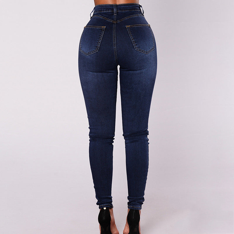 Dam skinny-jeans med hög midja i stretchigt denim, formande sömmar och böjt midjeband, blåfärgade framifrån.