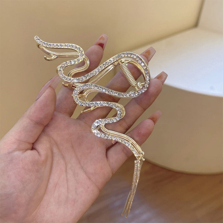 "Damhårklämmor i strassmetall, guld och silver, elegant design, perfekt för stil och elegans, kvinnliga accessoarer."