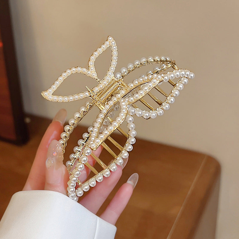 "Damhårklämmor i strassmetall, guld och silver, elegant design, perfekt för stil och elegans, kvinnliga accessoarer."