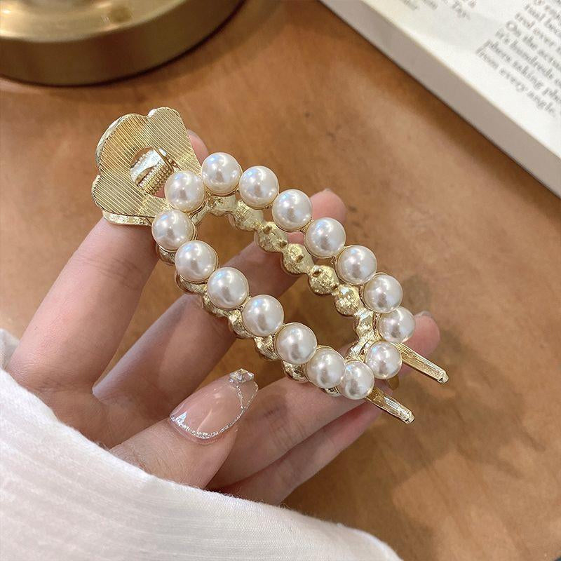 "Damhårklämmor i strassmetall, guld och silver, elegant design, perfekt för stil och elegans, kvinnliga accessoarer."