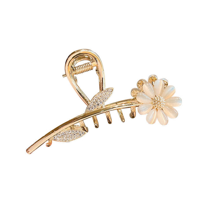 "Damhårklämmor i strassmetall, guld och silver, elegant design, perfekt för stil och elegans, kvinnliga accessoarer."