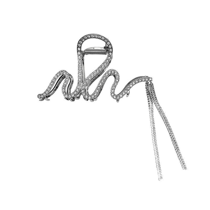 "Damhårklämmor i strassmetall, guld och silver, elegant design, perfekt för stil och elegans, kvinnliga accessoarer."