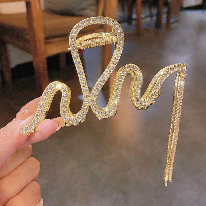 "Damhårklämmor i strassmetall, guld och silver, elegant design, perfekt för stil och elegans, kvinnliga accessoarer."
