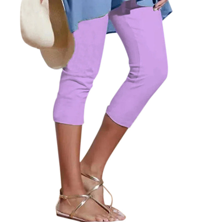 "Damhögmidja 3/4 yoga leggings med fickor, knälång, svart, smörmjuk yta, hög midja, främre fickor, stretchigt tyg."